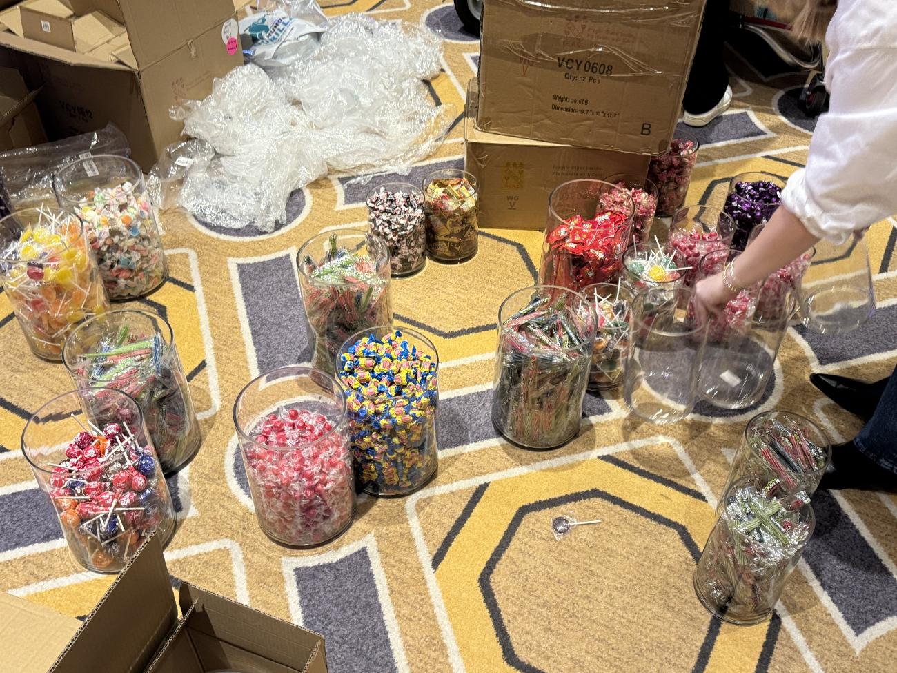 Candy and display inventory staged on the floor